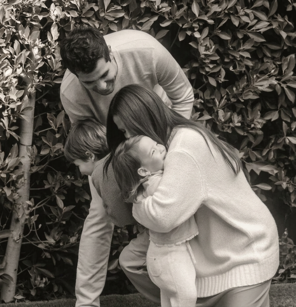 A family embracing outdoors
